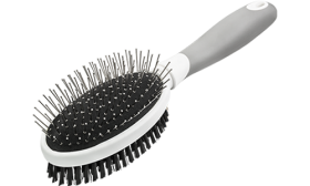 Brosse double face pour chien, avec poignée ergonomique, picots métalliques d’un côté et poils doux de l’autre.